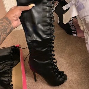 Black thigh high faux leather boots